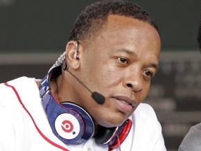 Recording artist Dr. Dre wears a pair of Beats headphones as he attends the 2010 season opener baseball game between the New York Yankees and Boston Red Sox in Boston