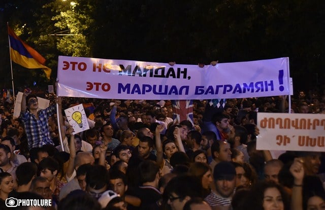 26/06/2015. YEREVAN, ARMENIA. A great amount of people on the 4th day of protest action against electricity price increase in Baghramyan Avenue. On the poster is written 'This is not Maidan this is Marshal Baghramyan'
