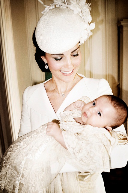 KING'S LYNN, ENGLAND - JULY 05: (EDITORIAL USE ONLY)   In this handout image supplied by Mario Testino/ Art Partner,  Catherine, Duchess of Cambridge and her daughter Princess Charlotte of Cambridge pose for a photo in the Drawing Room at Sandringham House after the christening of Princess Charlotte of Cambridge on the Sandringham Estate on July 5, 2015 in King's Lynn, England. (Photo by Mario Testino/ Art Partner via Getty Images) ***Terms of release, which must be included and passed-on to anyone to whom this image is supplied: USE AFTER 10/10/2015 must be cleared by Art Partner. This photograph is for editorial use only. NO commercial use. NO use in calendars, books or supplements. Use on a cover, or for any other purpose, will require approval from Art Partner and the Kensington Palace Press Office. There is no charge for the supply, release or publication of this official photograph. This photograph must not be digitally enhanced, manipulated or modified and must be used substantially uncropped.  Picture must be credited: copyright Mario Testino /Art Partner***