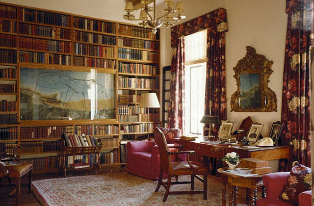 Kent, England, UK --- Library at Chartwell, home of Sir Winston Churchill from 1924. Showing bookshelves inset with relief model of the artificial harbour of Port Arromanches in Normandy, as it was on 23/9/44 --- Image by © Andreas von Einsiedel/Corbis
