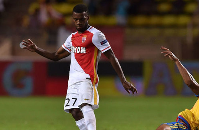 MONACO - AUGUST 25:  Thomas Lemar (L) of Monaco is tackled by Danilo Barbosa of Valencia during the UEFA Champions League qualifying round play off second leg match between Monaco and Valencia on August 25, 2015 in Monaco, Monaco.  (Photo by Valerio Pennicino/Getty Images)